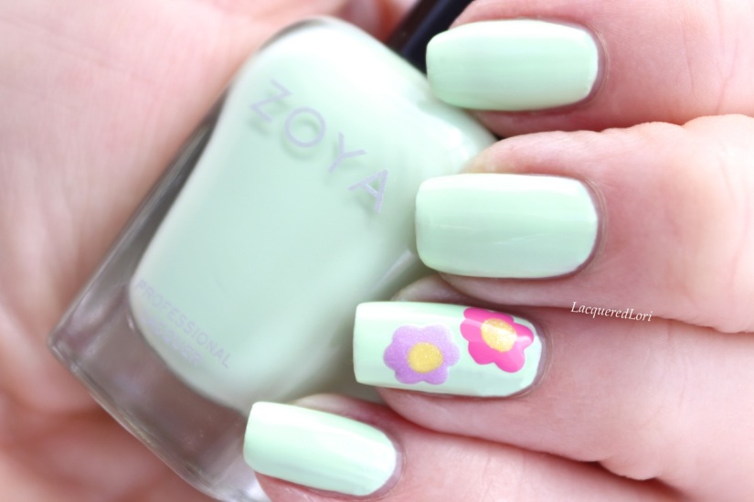 Tiana by Zoya can be best described as a pistachio gelato green in a glossy cream finish. My fave of the three cremes. It inspired me to add a dash of springlike whimsy! Color Family - Green  Finish - Cream  Intensity - 5 ( 1 = Sheer - 5 = Opaque )  Tone - Cool 