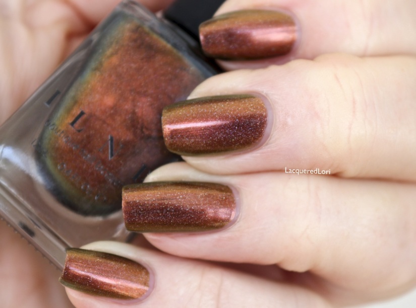 Abundance (now in holo) is described as, Abundance is an absolutely gorgeous fall themed Ultra Chrome that couldn't be more suited to the colors of the season! Abundance effortlessly shifts through super vivid hues of red, orange, bronze, and gold. Now add to that holographic microparticles and you have a seriously gorgeous warm sparkler!