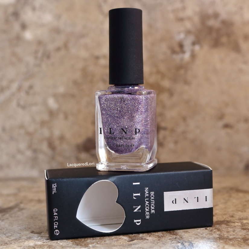 ILNP describes Happily Ever After as, "lavender holographic stunner accented with the perfect amount of silver flakes." 