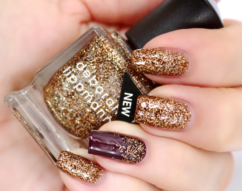 Can't Be Tamed is gorgeous with it's tiny gold and bits of holo glitters in a honey jelly base. One coat is great as a gradient topper (here over Miss Independent) or only 2 coats for a full coverage mani.