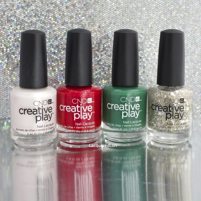 The last four CND Creative Play™ holiday shades in this series are so fun and so gorgeous. Four totally different finishes for your December manis! From left: Bridezilla (an opalescent shimmer white), Revelry Red (a Santa red crelly-like base with nicely spaced small glitter), Happy Holly Day (highly pigmented Christmas tree green), and Stellarbration (a gold and silver glitter topper including tiny stars).