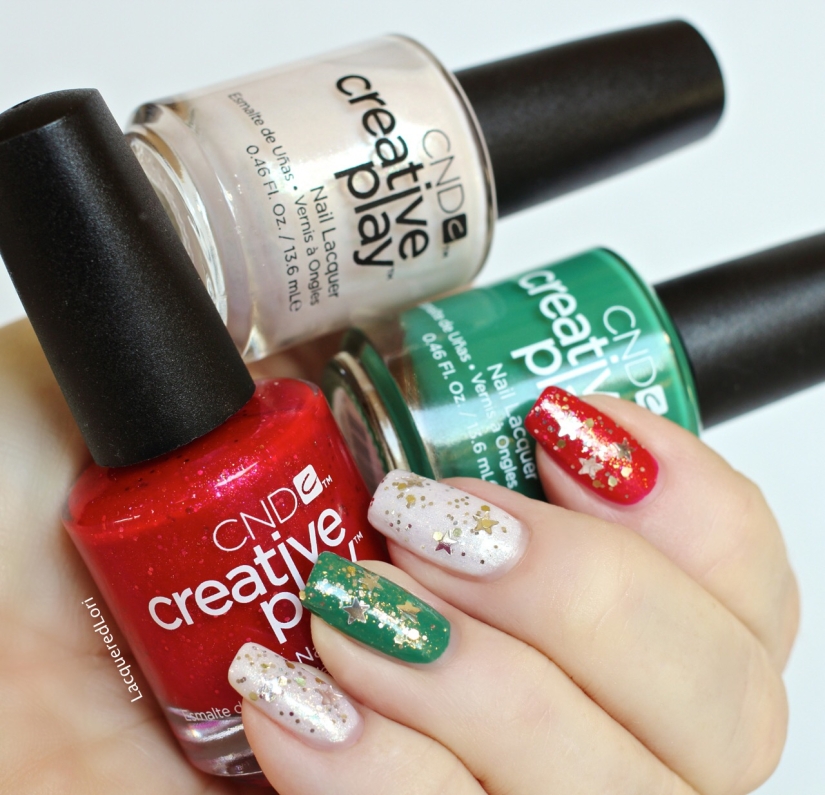 Yeah, I was so AFRAID I was going to drop one of those. LOL My CND Creative Play™ holiday mani using Revelry Red 2 coats, Happy Holly Day 2 coats, Bridezilla 2 coats, and topped with Stellarbration.